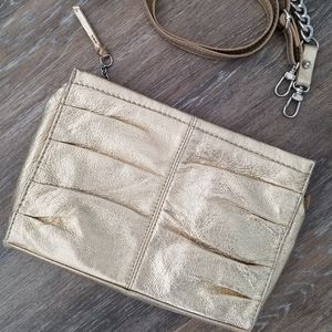 The Sak gold leather bag